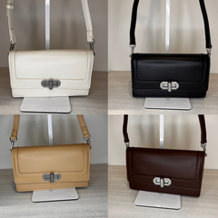 Pochette Regina Schrecker con tracolla, dettaglio della chiusura
