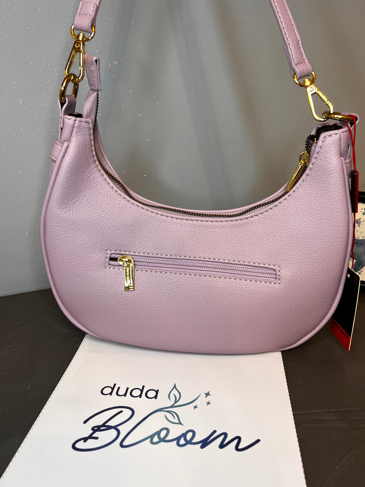 Borsa a tracolla piccola Pierre Cardin lilla, vista laterale